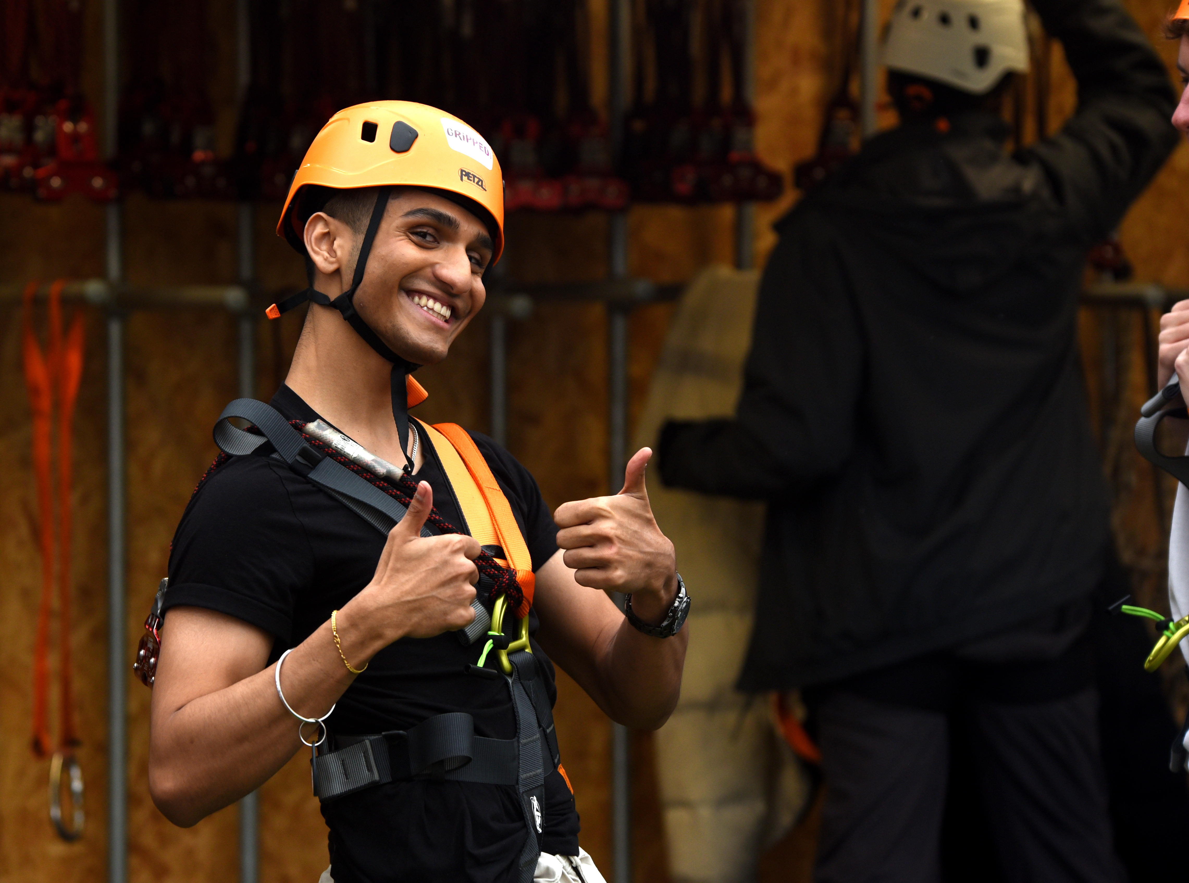 Content creator smiling and posing in harness at Gripped West London for influencer TikTok and Instagram content