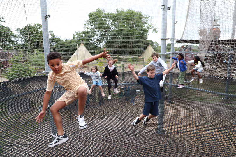Children jumping and playing on the Adventure Nets during a Sky Nets Adventure Party at Gripped London.